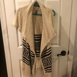 Long Sweater with no sleeves